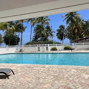 https://relaxing-beach-condo-5-mins-from-airport.comcaribbean.com